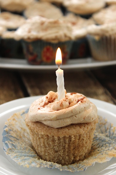 These Snickerdoodle Cupcakes with Brown Sugar Cinnamon Frosting are light and tender with a hint of warmth. This cooked icing is barely sweetened, meaning these are perfect for a birthday party or just with a cup of afternoon tea. | www.tastyoasis.net