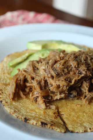 This Chipotle Barbecue Pulled Pork in the Crockpot is one of the easiest ways to get comfort food on your table with very little effort. It's smokey, sweet and spicy all at the same time, and it can serve a crowd or fill your freezer with leftovers. | www.tastyoasis.net