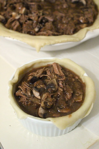 Donna Hay's Beef, Guinness and Mushroom Pie with a Hot Water Pastry Crust is a hearty meal that's a perfect weekend project. You can double it, and make an extra pie for your freezer or a friend. The pastry dough is easy to make, stands up to a heavy filling, and is flaky and buttery. It's definitely worth the effort! | www.tastyoasis.net